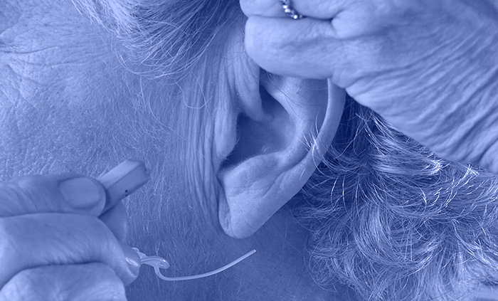 Senior Woman Wearing A Hearing Aid