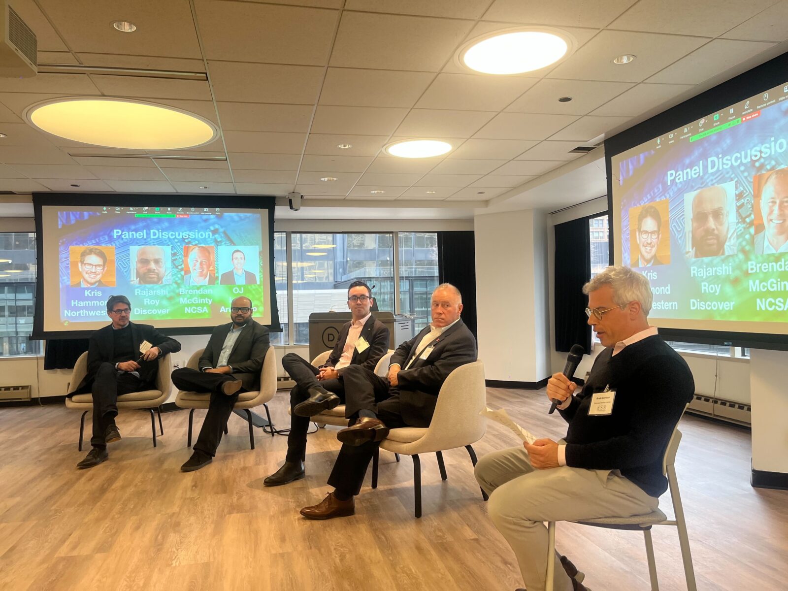 Kris Hammond, Rajarshi Roy, OJ Laos, and Brendan McGinty on the panel moderated by Spirrison.